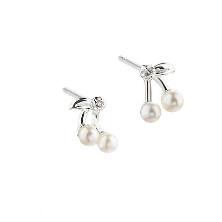 Aqua Dulce Cherry Pearl øreringe i sølv med hvide perler og funklende detalje, Model 5703-1.