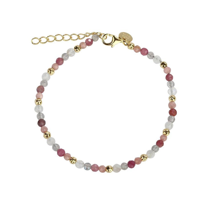 Aqua Dulce SUN Armbånd viser et delikat perlearmbånd i rosa, hvide og guldfarvede perler. Model4556-4556-1