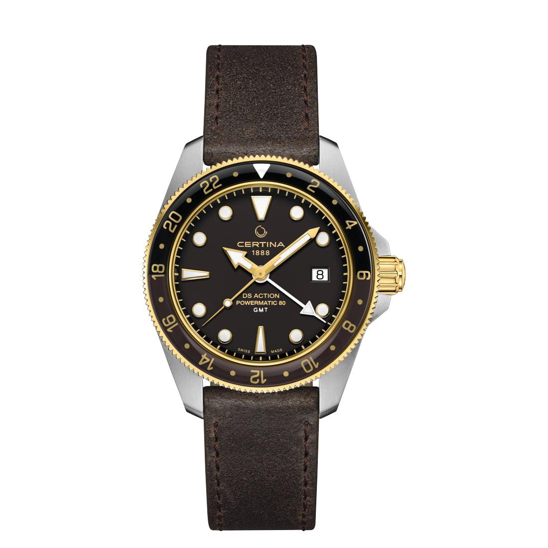 Certina DS Action GMT Powermatic 80 med sort urskive, gulddetaljer og brun læderrem. Model C0329292605100