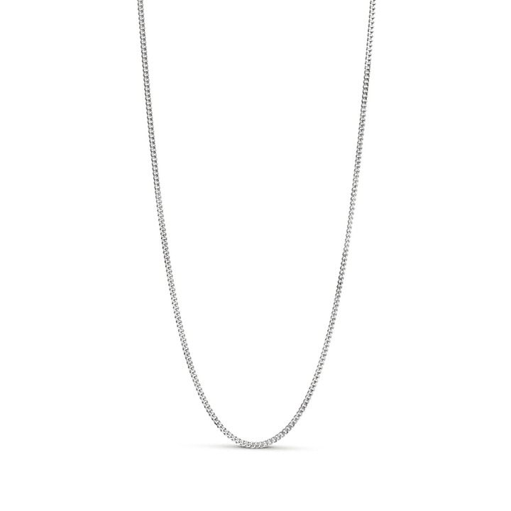 Enamel Curb Chain Necklace solv viser en enkel, sølvfarvet kæde i blankt metal. Model N115S-N115S-1.