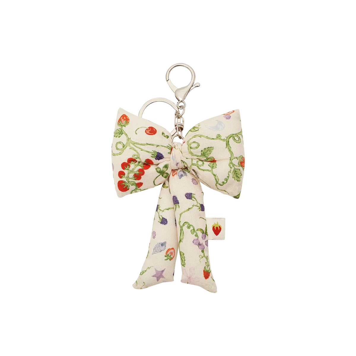 Maanesten Fabric Bow Nøglering Garden Magic Ivory viser en stor stofsløjfe med blomsterprint og sølv farvet nøglekrog. Model 4111