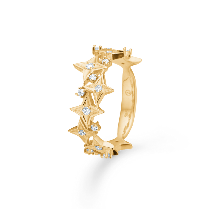 Mads Z Vesper 14kt Stjerne Ring 0.20ct W SI viser guldring med funklende stjerner og diamanter. Model 1541197-001.