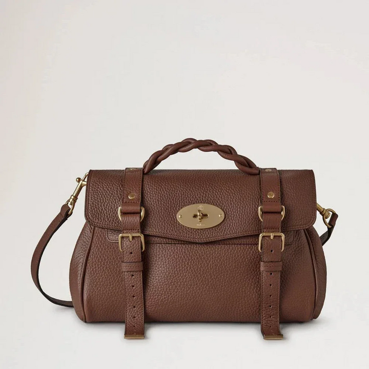 Mulberry Alexa Heavy Grain Bright Oak viser en brun lædertaske med flettet hank og gyldne detaljer. Model HH6746/736G222.
