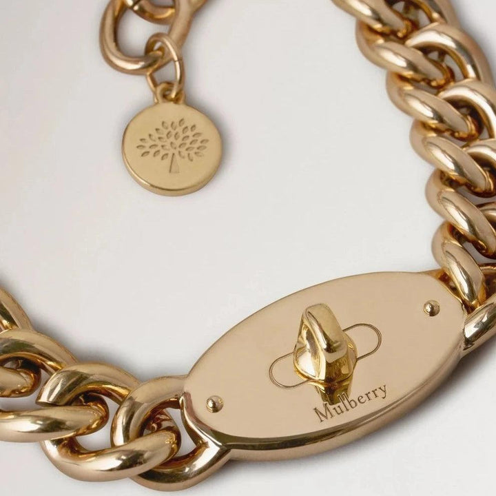 Mulberry Bayswater Chunky Chain Necklace viser et nærbillede af halskæde i guldfarvet metal, Model qn2355000p140.