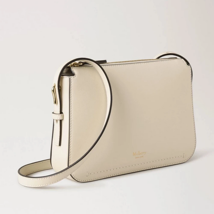 Mulberry Clovelly Pouch Micro Classic Grain Eggshell, lille cremehvid lædertaske med justerbar rem. Model RL8729587H687.