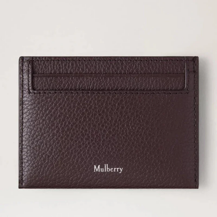 Mulberry Heritage Credit Card Slip Small Classic Grain Ebony viser et mørkebrunt læder kreditkortholder med logo. Model RL4064205A110