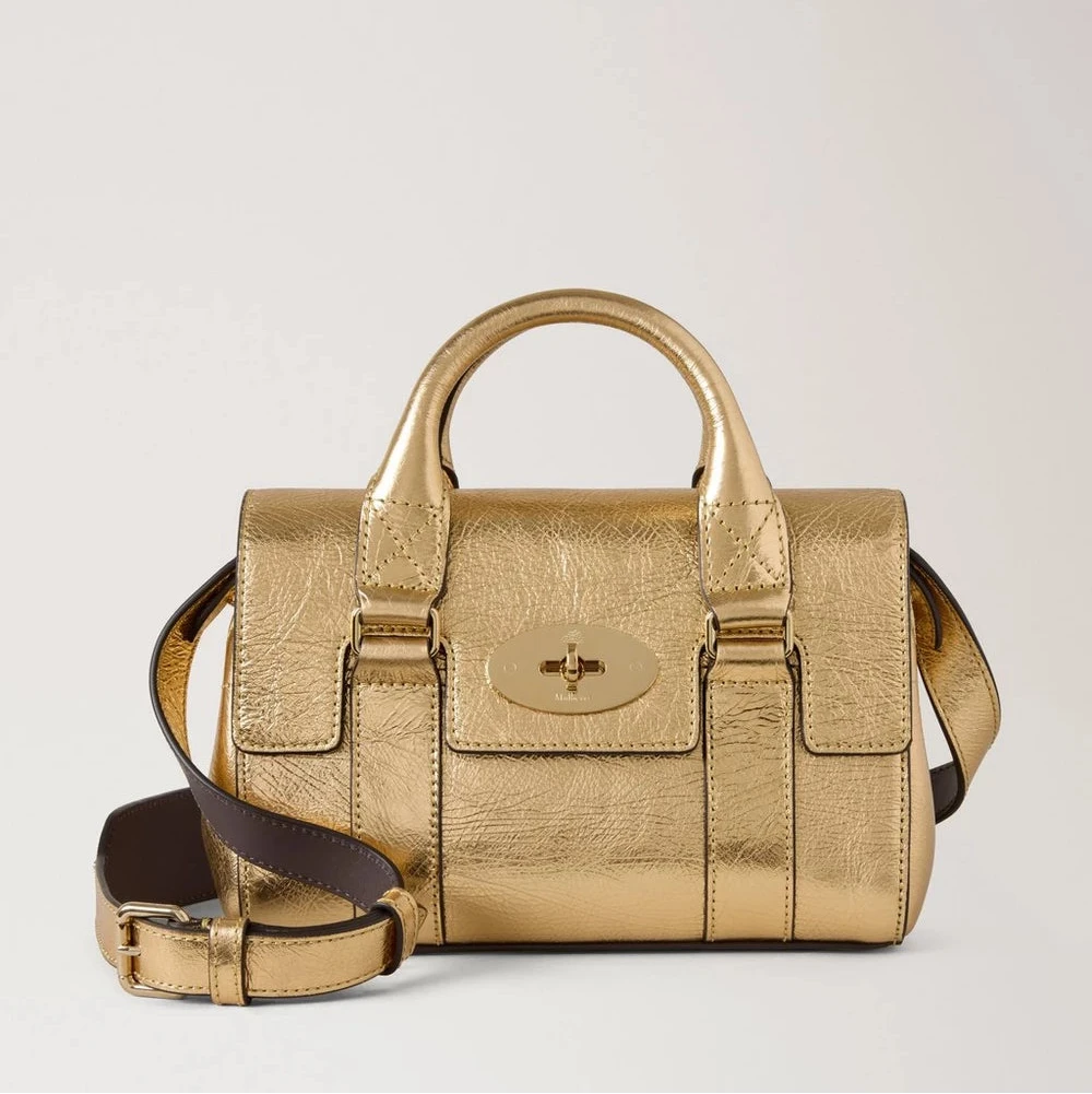 Mulberry Mini Heritage Bayswater Metallic Somerset Gold viser en lille håndtaske i skinnende guld med skulderrem, Model RL8918757Z098.