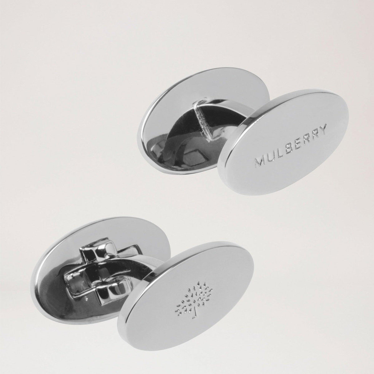 Mulberry Oval Reversible Cufflinks, elegante ovale manchetknapper i sølvfarvet messing. Model qc1312160d130.