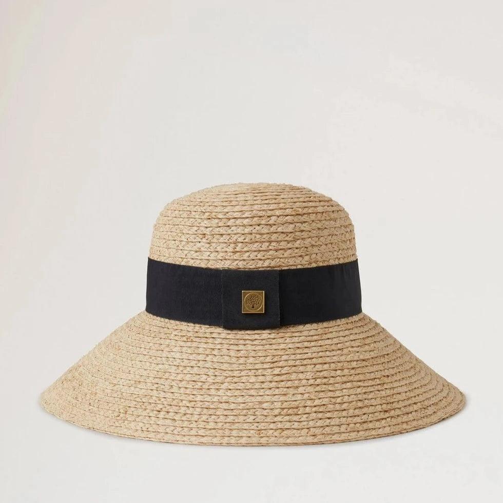 Mulberry Raffia Sun Hat Wide Brim viser en naturfarvet stråhat med bred sort bånd. Model VH4136060H120-001-1