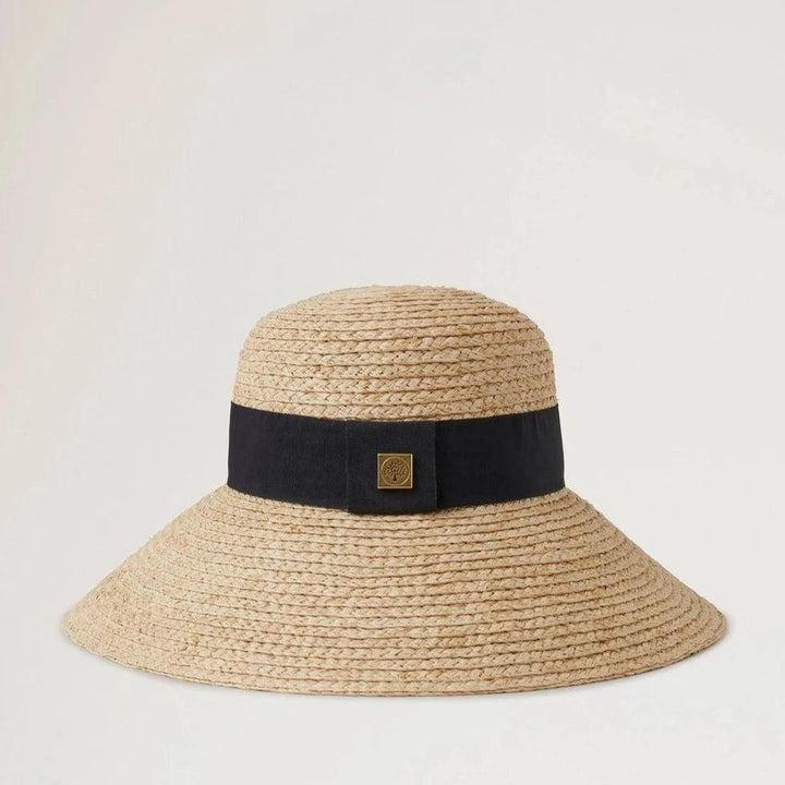 Mulberry Raffia Sun Hat Wide Brim viser en naturfarvet stråhat med bred sort bånd. Model VH4136060H120-001-1