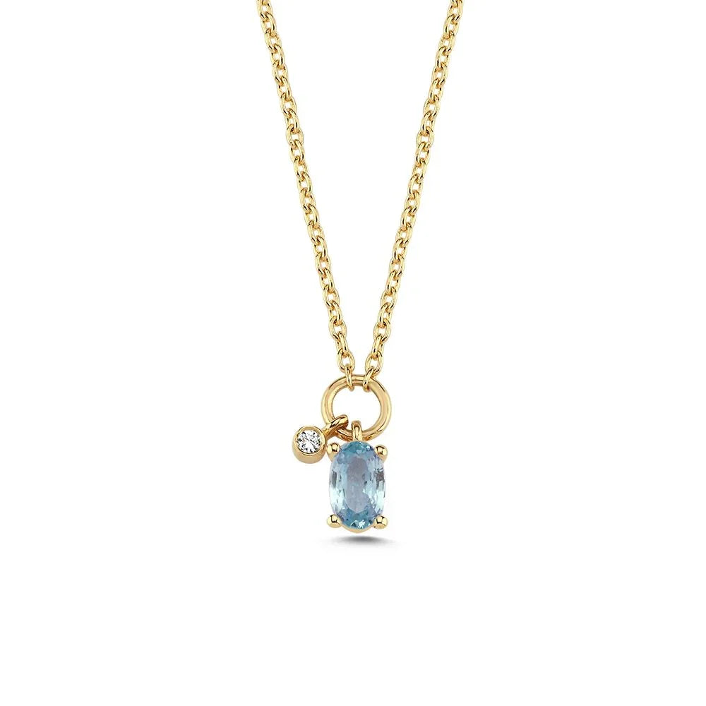 nuran-gaia-14kt-halskaede-bla-safir-og-0-01ct-w-si-v2570sa-001rg. Elegant halskæde i gult guld med blå safir og lille klar sten. Model v2570sa-001rg