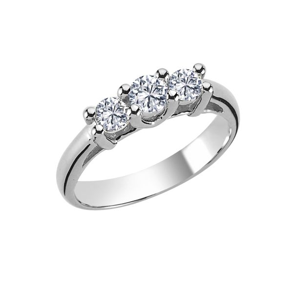 Nuran Tria 14kt hvidguld ring 0.16ct WSI viser en elegant ring med tre klare diamanter. Model L1968-016HG-001