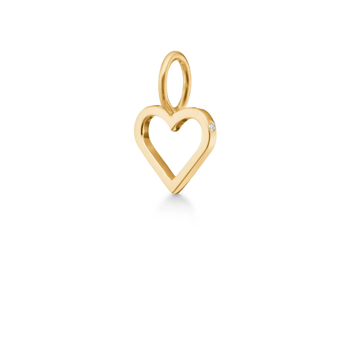 ro copenhagen symbols open heart vedhæng 18 kt guld viser et hjertevedhæng i blankt guld med lille diamantdetalje. Model p111y107-1