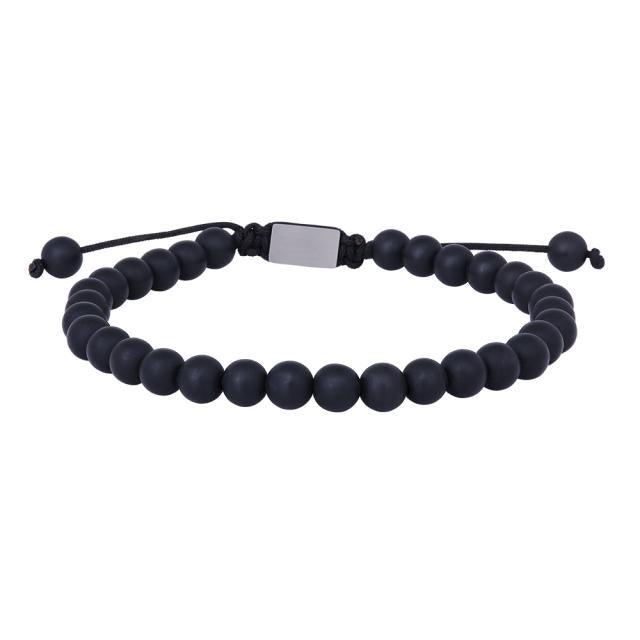 Son of Noa Sten Armbånd viser et sort perlearmbånd med justerbar snor, mat finish. Model 80980040000