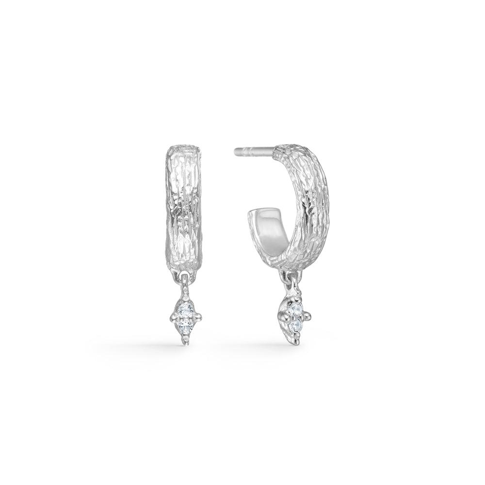 studio z cluster solv creoler med zirkonia viser elegante sølvøreringe med struktur og klare sten, Model 7117840-1