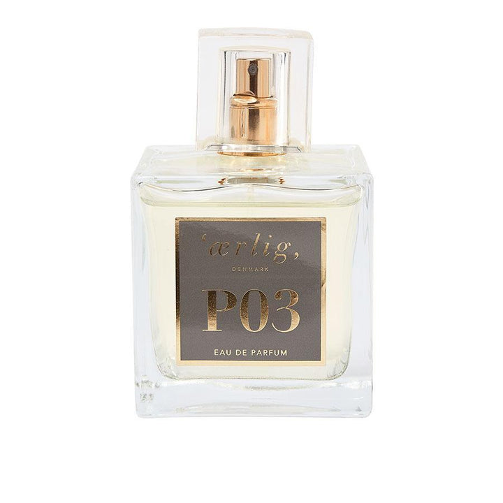 ærlig, P03 eau de parfum i klar, firkantet flaske med gylden label og spraytop. Model p03-100ml-p3-1.