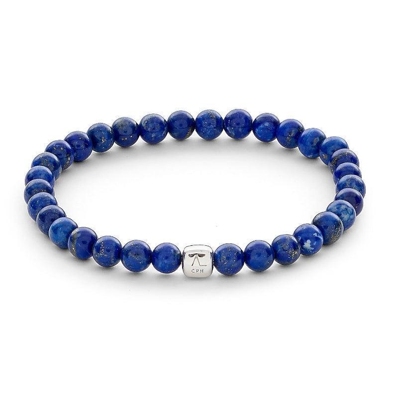 Alexander Lynggaard Armbånd Lapis 6mm med runde blå perler og en sølvfarvet detalje. Model c00153-001-1
