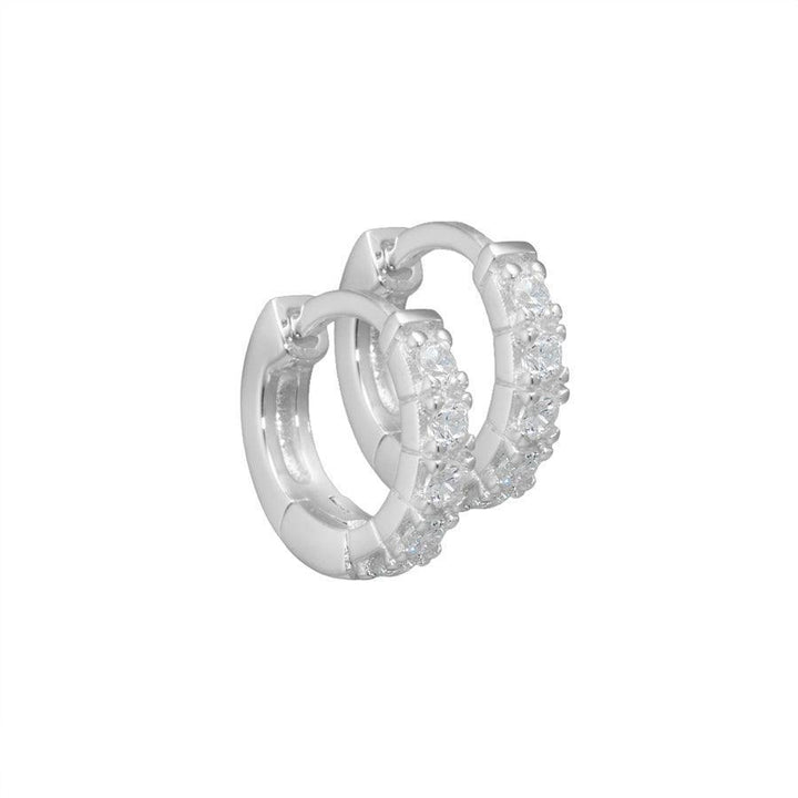 Aqua Dulce Darling sølv øreringe med skinnende klare sten, rund model. Model 2098-2098-1