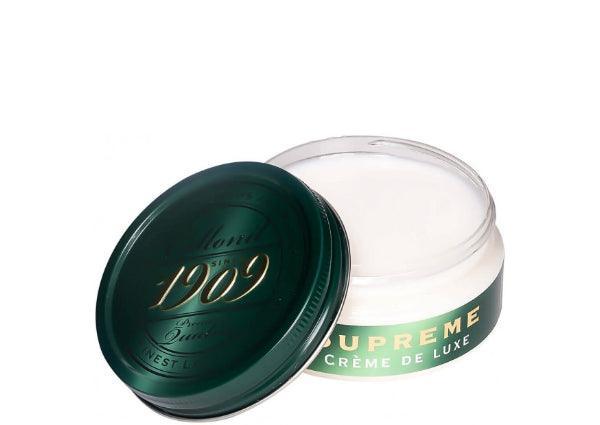 Collonil Supreme Creme Neutral vist som en rund, åben krukke med grøn låg og hvid creme. Model79540000050