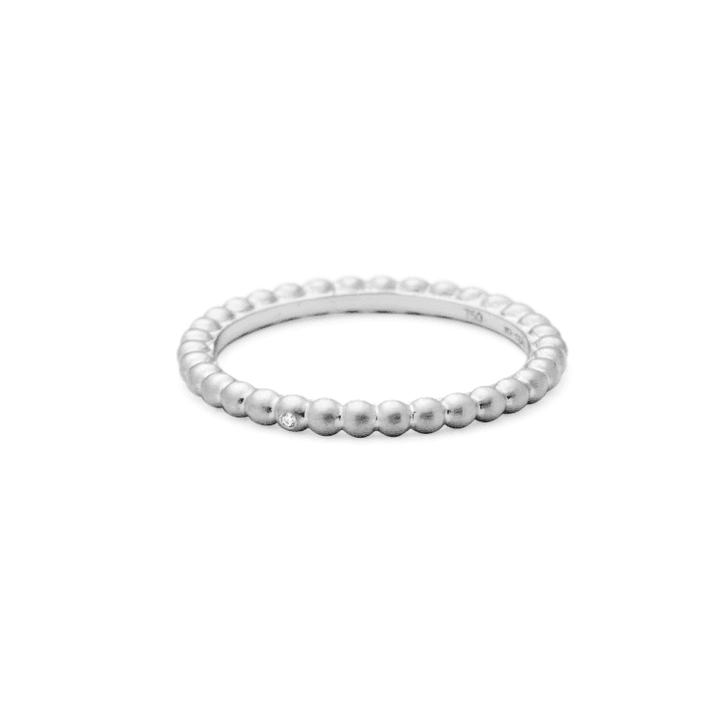 RO Copenhagen 18kt Orbit Dot Ring Hvidguld, enkel ring i hvidguld med diskret perlelook. Model 90658-001.